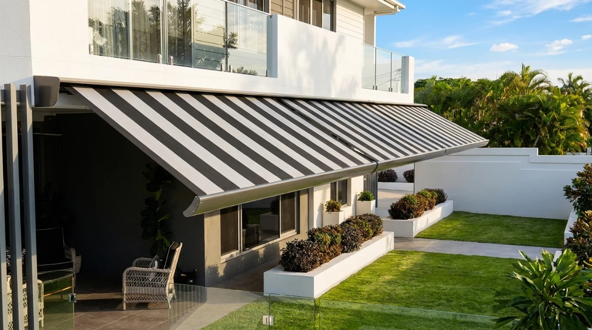 Sienna folding arm awnings over an outdoor deck